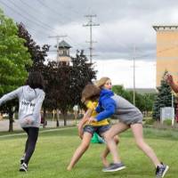 Students play a learning game outside